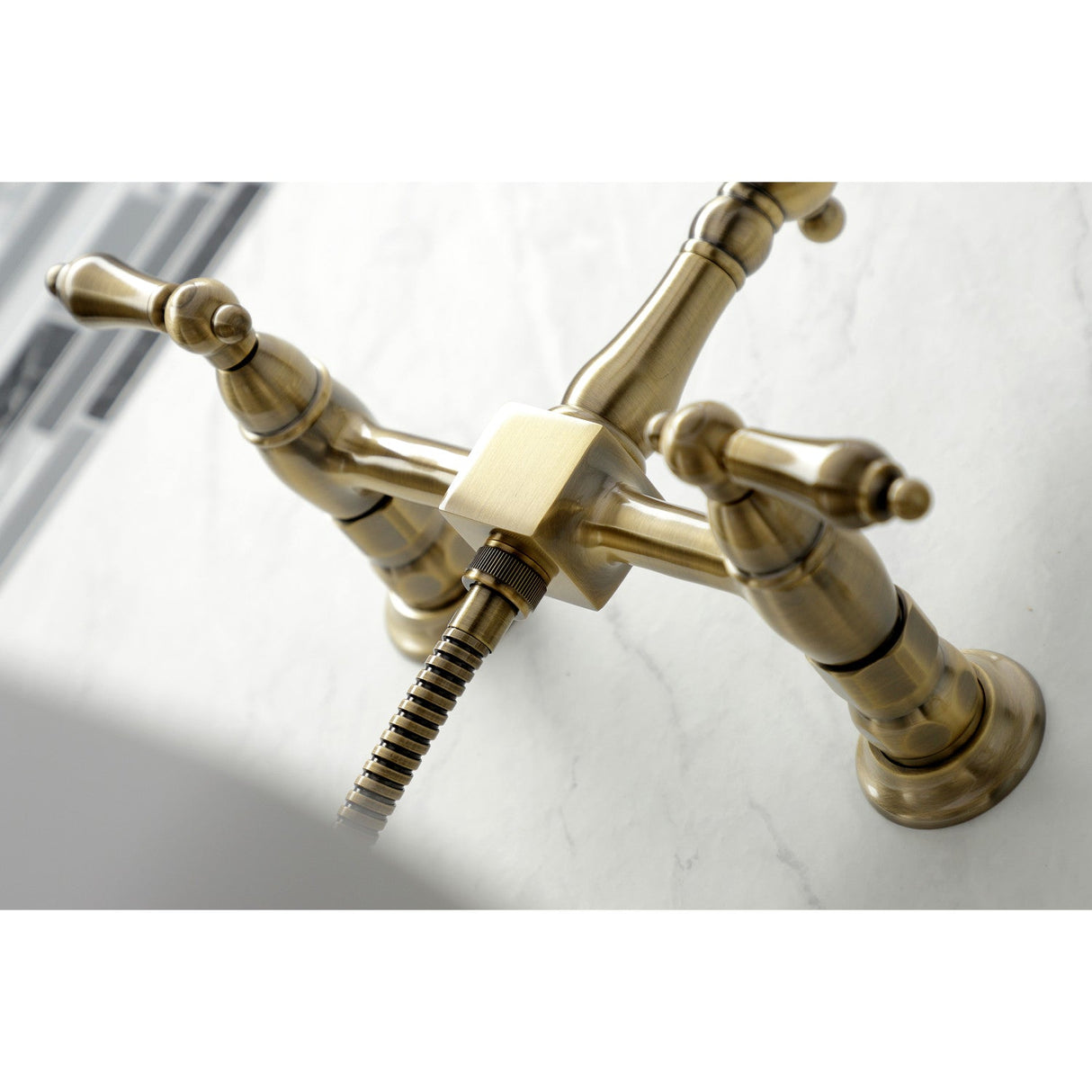 Heritage KS1263ALBS Two-Handle 2-Hole Wall Mount Bridge Kitchen Faucet with Brass Sprayer, Antique Brass