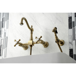 Heritage KS1263AXBS Two-Handle 2-Hole Wall Mount Bridge Kitchen Faucet with Brass Sprayer, Antique Brass