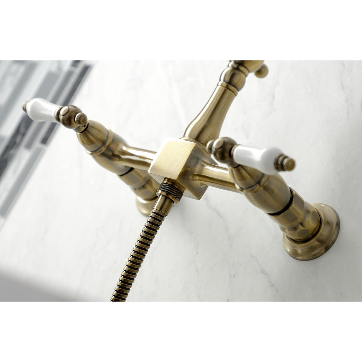 Heritage KS1263PLBS Two-Handle 2-Hole Wall Mount Bridge Kitchen Faucet with Brass Sprayer, Antique Brass