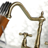 Heritage KS1273AXBS Two-Handle 4-Hole Deck Mount Bridge Kitchen Faucet with Brass Sprayer, Antique Brass