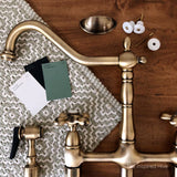 Heritage KS1273AXBS Two-Handle 4-Hole Deck Mount Bridge Kitchen Faucet with Brass Sprayer, Antique Brass