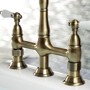 Heritage KS1273PLBS Two-Handle 4-Hole Deck Mount Bridge Kitchen Faucet with Brass Sprayer, Antique Brass