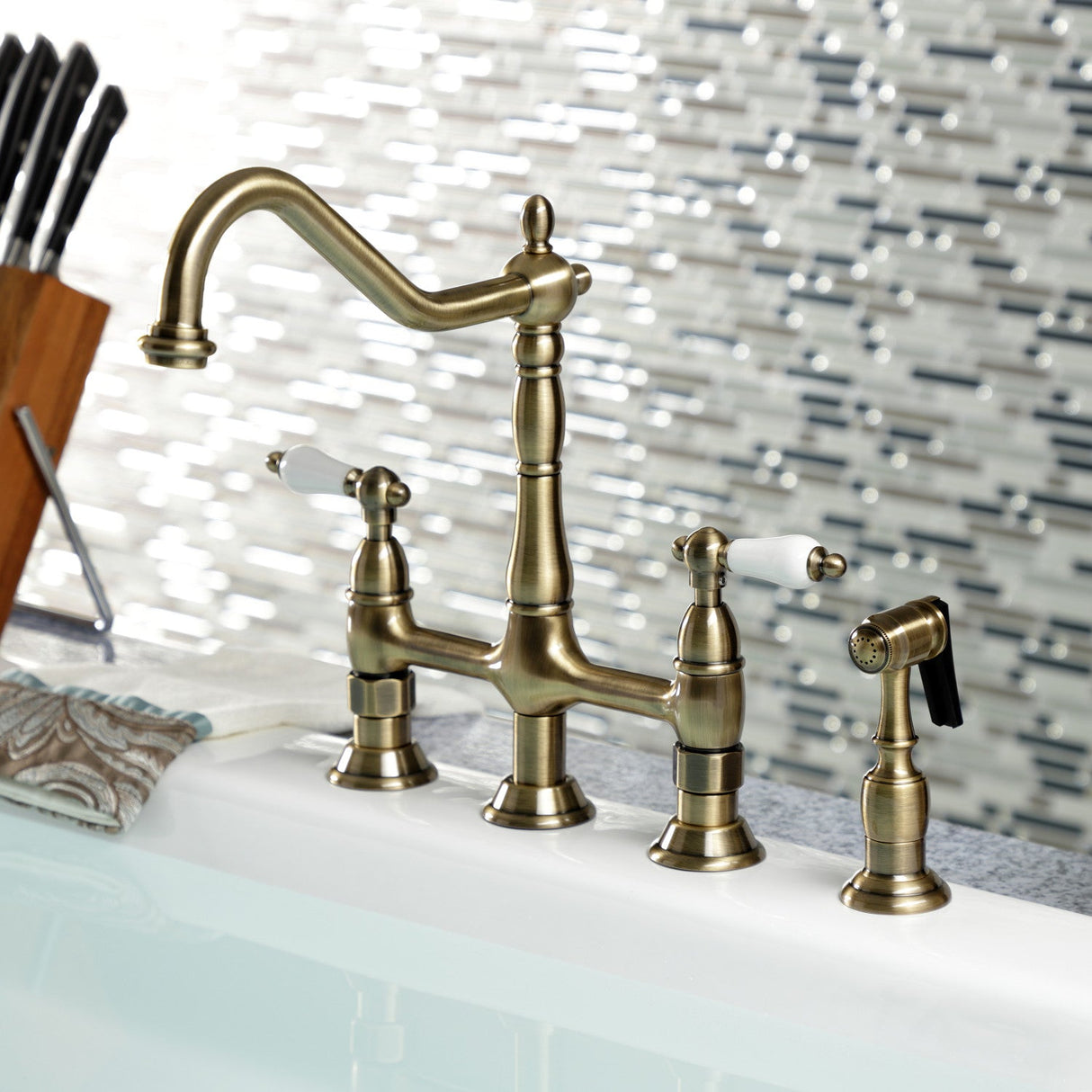 Heritage KS1273PLBS Two-Handle 4-Hole Deck Mount Bridge Kitchen Faucet with Brass Sprayer, Antique Brass