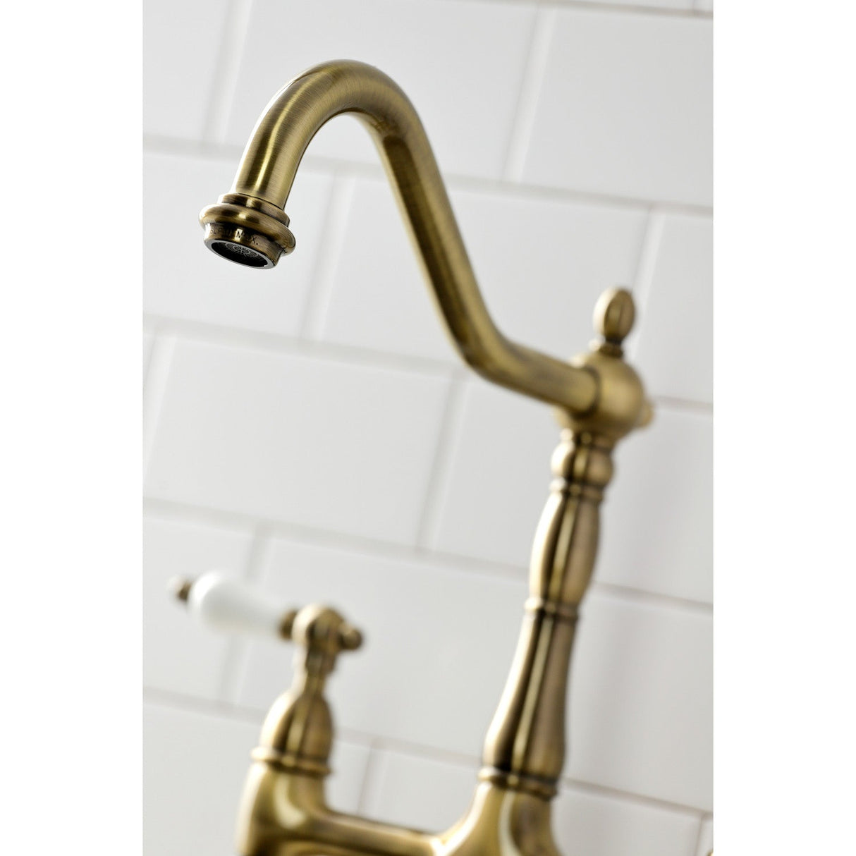 Heritage KS1273PLBS Two-Handle 4-Hole Deck Mount Bridge Kitchen Faucet with Brass Sprayer, Antique Brass