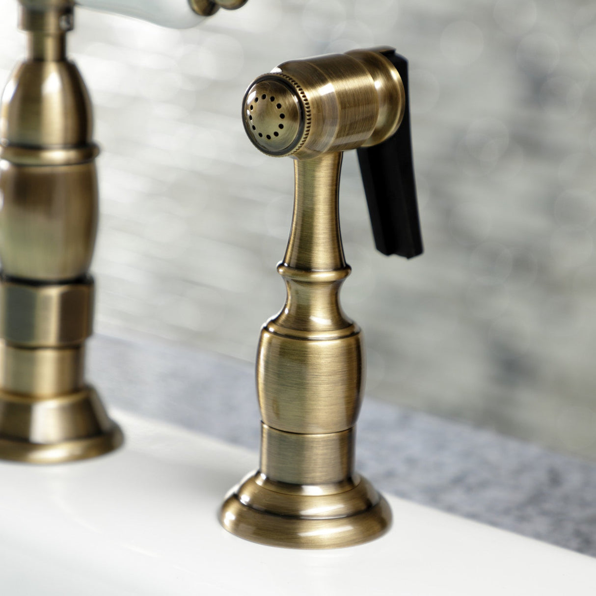 Heritage KS1273PLBS Two-Handle 4-Hole Deck Mount Bridge Kitchen Faucet with Brass Sprayer, Antique Brass