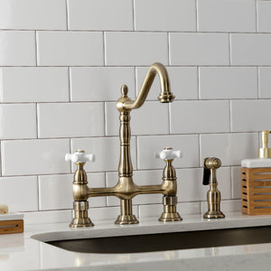 Heritage KS1273PXBS Two-Handle 4-Hole Deck Mount Bridge Kitchen Faucet with Brass Sprayer, Antique Brass