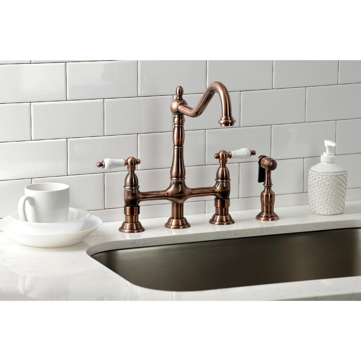 Heritage KS127PLBSAC Two-Handle 4-Hole Deck Mount Bridge Kitchen Faucet with Brass Sprayer, Antique Copper