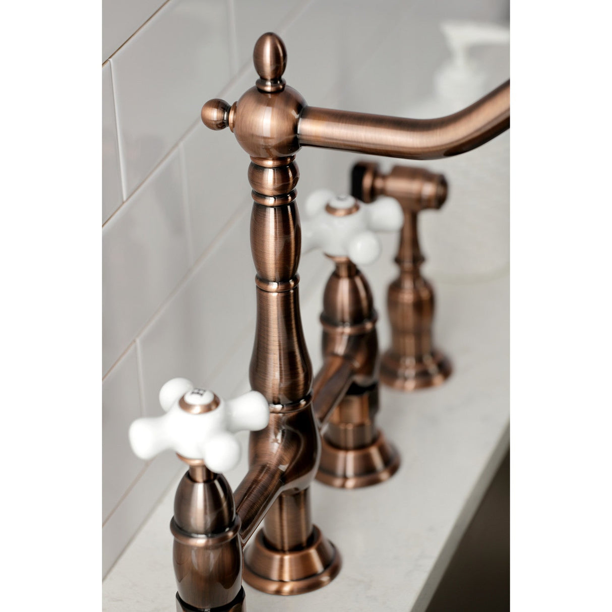 Heritage KS127PXBSAC Two-Handle 4-Hole Deck Mount Bridge Kitchen Faucet with Brass Sprayer, Antique Copper