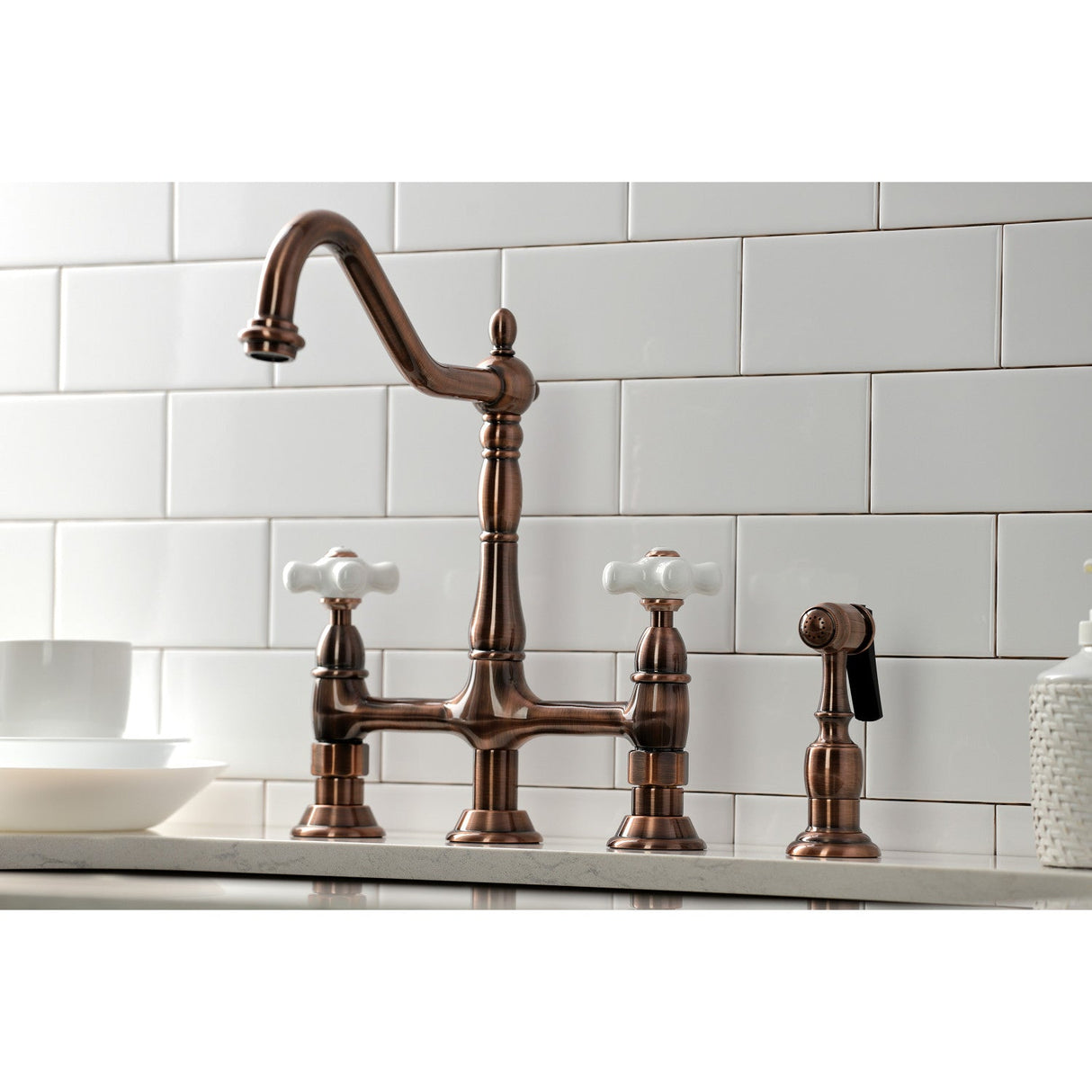 Heritage KS127PXBSAC Two-Handle 4-Hole Deck Mount Bridge Kitchen Faucet with Brass Sprayer, Antique Copper