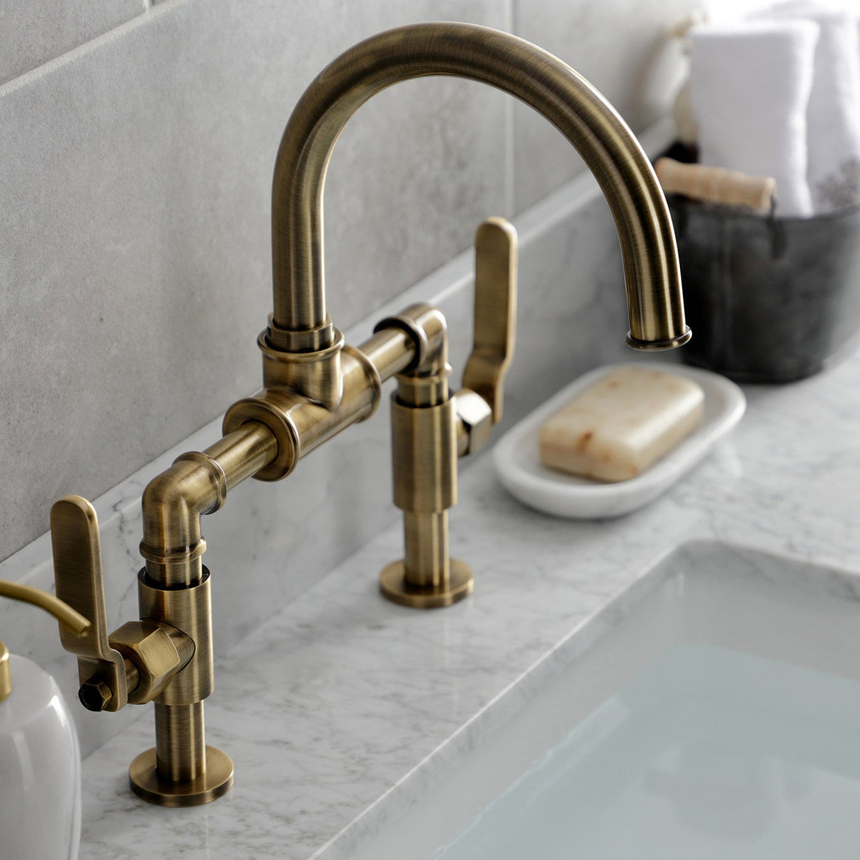 Whitaker KS2173KL Two-Handle 2-Hole Deck Mount Bridge Bathroom Faucet with Pop-Up Drain, Antique Brass