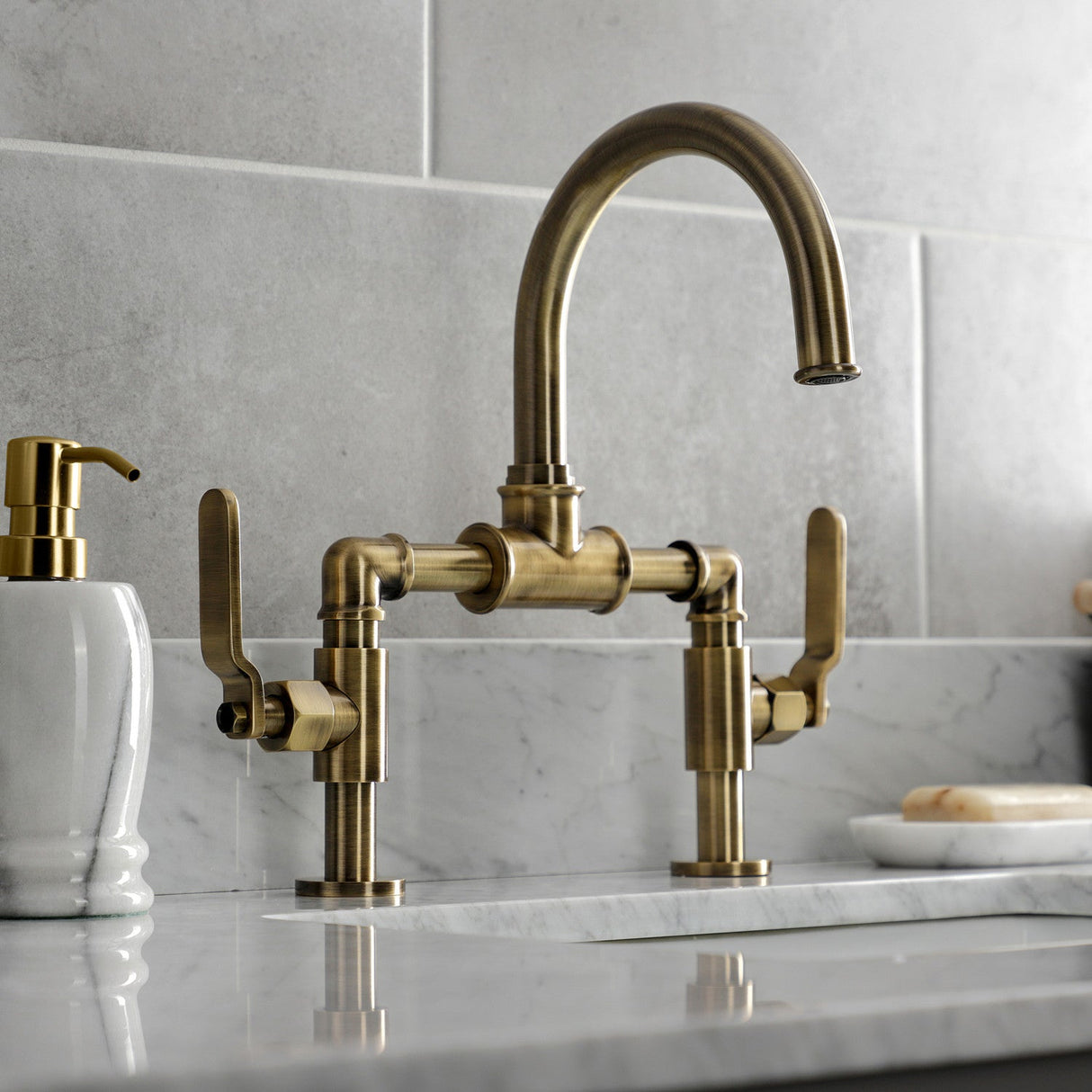 Whitaker KS2173KL Two-Handle 2-Hole Deck Mount Bridge Bathroom Faucet with Pop-Up Drain, Antique Brass