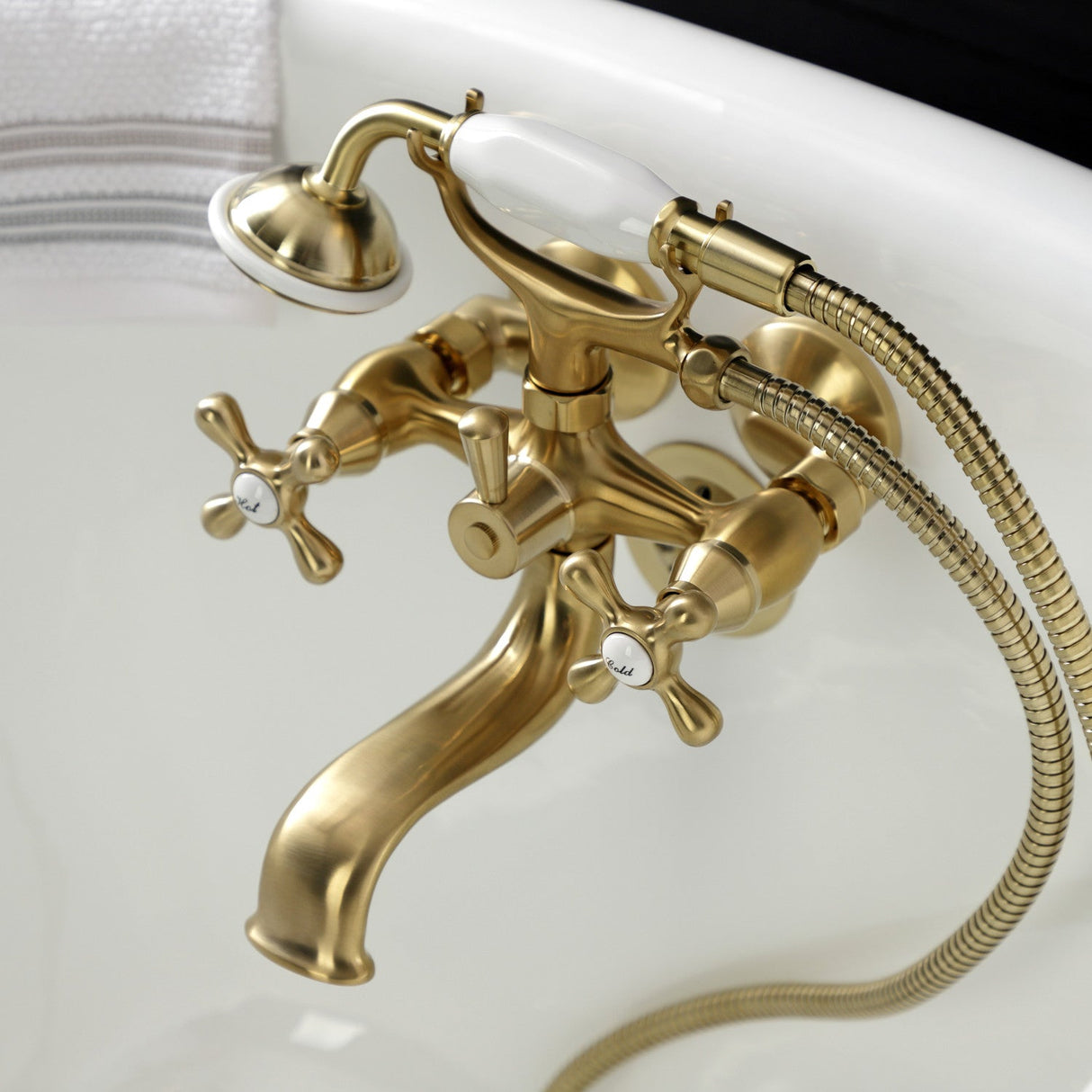 Kingston KS225SB Three-Handle 2-Hole Tub Wall Mount Clawfoot Tub Faucet with Handshower, Brushed Brass