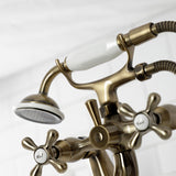 Kingston KS227AB Three-Handle 2-Hole Deck Mount Clawfoot Tub Faucet with Handshower, Antique Brass