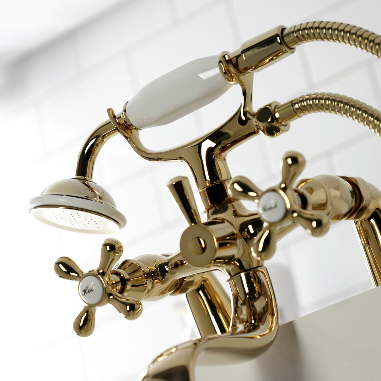 Kingston KS227PB Three-Handle 2-Hole Deck Mount Clawfoot Tub Faucet with Handshower, Polished Brass