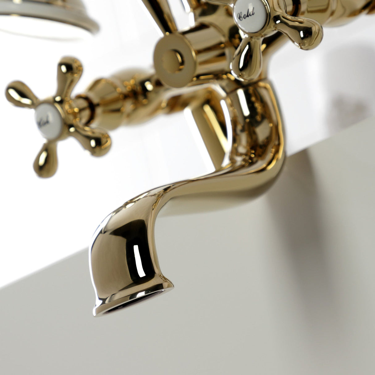 Kingston KS227PB Three-Handle 2-Hole Deck Mount Clawfoot Tub Faucet with Handshower, Polished Brass