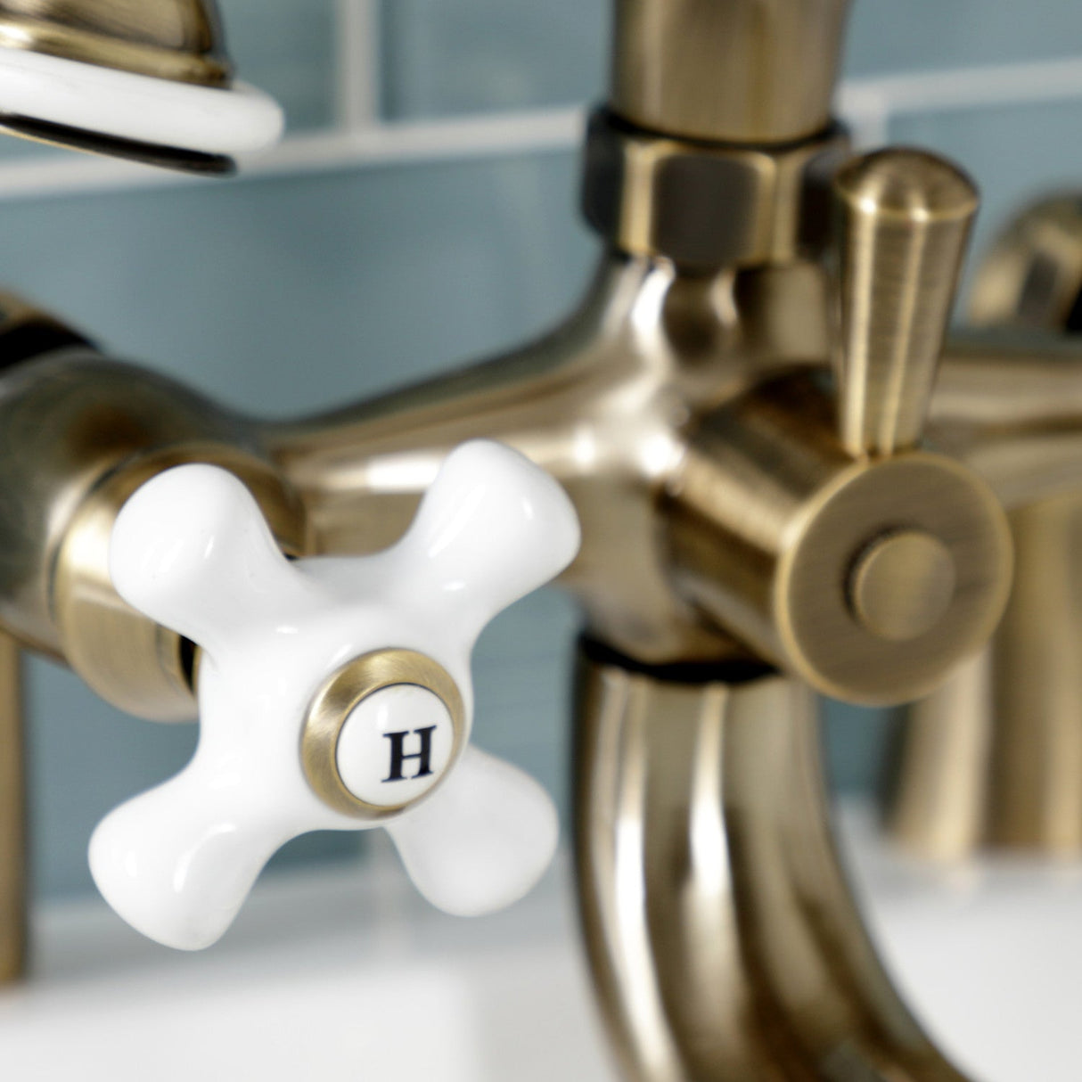 Kingston KS227PXAB Three-Handle 2-Hole Deck Mount Clawfoot Tub Faucet with Hand Shower, Antique Brass