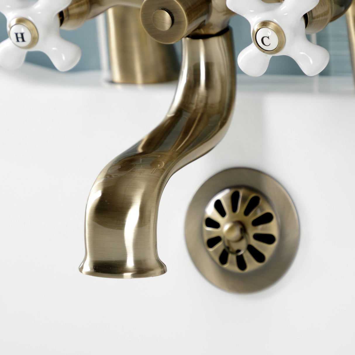 Kingston KS227PXAB Three-Handle 2-Hole Deck Mount Clawfoot Tub Faucet with Hand Shower, Antique Brass