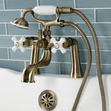 Kingston KS228PXAB Three-Handle 2-Hole Deck Mount Clawfoot Tub Faucet with Hand Shower, Antique Brass