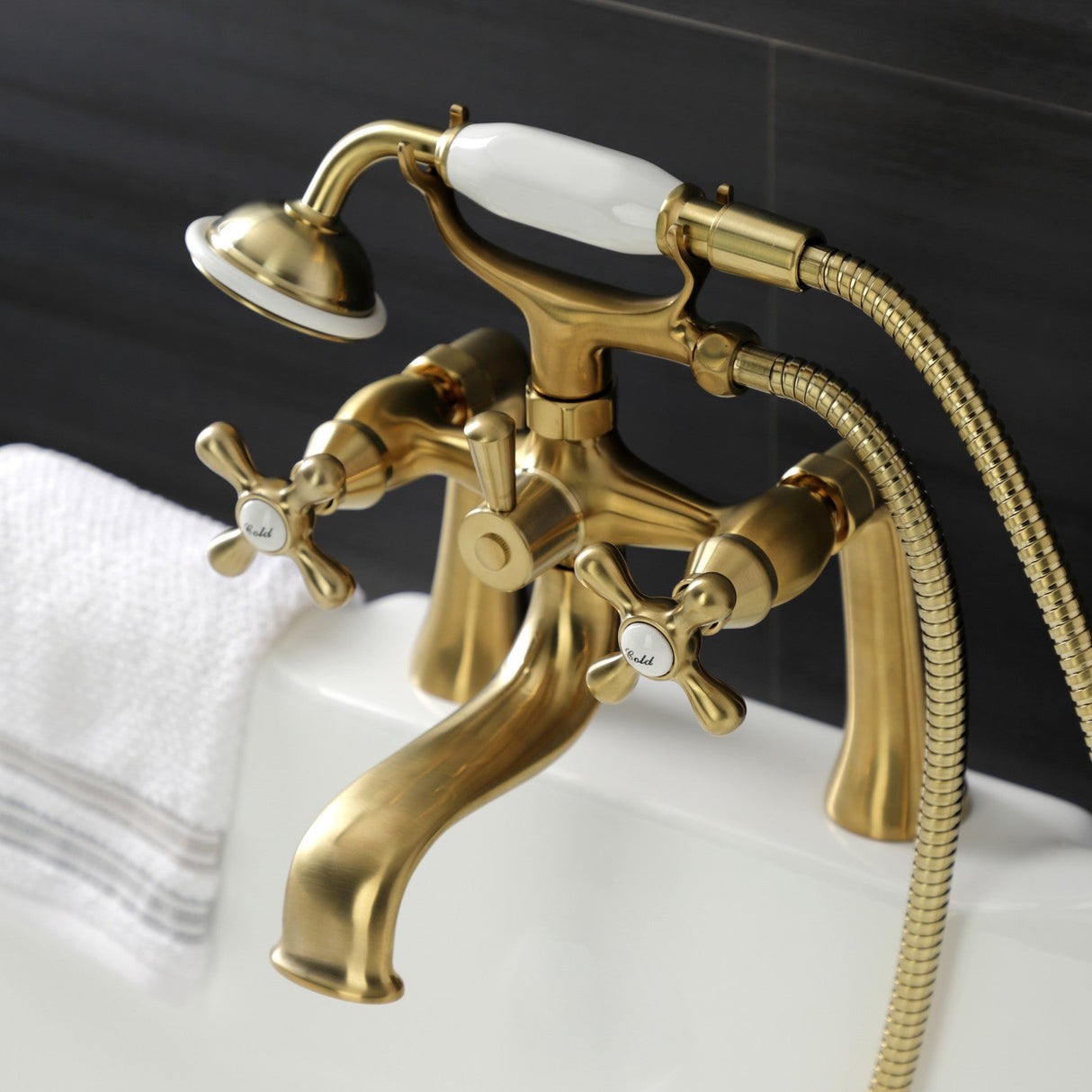Kingston KS228SB Three-Handle 2-Hole Deck Mount Clawfoot Tub Faucet with Handshower, Brushed Brass