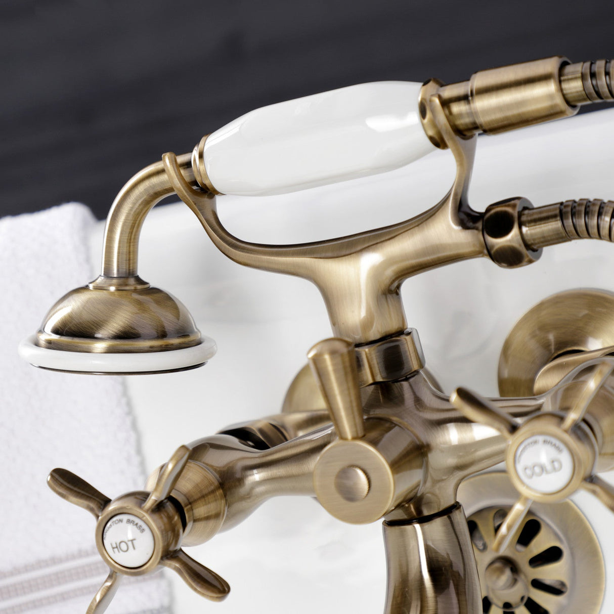 Essex KS245AB Three-Handle 2-Hole Tub Wall Mount Clawfoot Tub Faucet with Handshower, Antique Brass