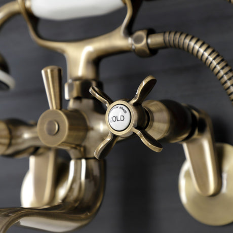 Essex KS246AB Three-Handle 2-Hole Wall Mount Clawfoot Tub Faucet with Handshower, Antique Brass