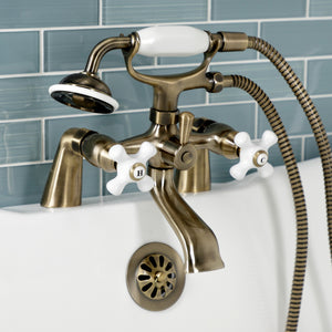 Kingston KS267PXAB Three-Handle 2-Hole Deck Mount Clawfoot Tub Faucet with Hand Shower, Antique Brass