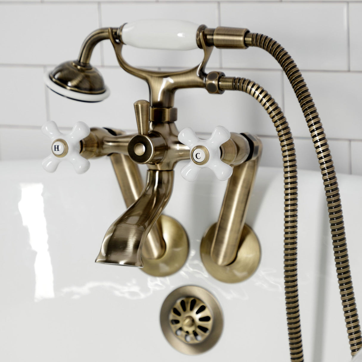 Kingston KS269PXAB Three-Handle 2-Hole Tub Wall Mount Clawfoot Tub Faucet with Hand Shower, Antique Brass