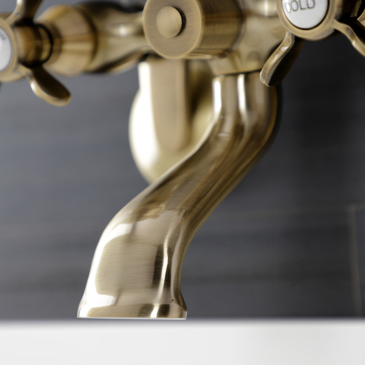 Essex KS286AB Three-Handle 2-Hole Wall Mount Clawfoot Tub Faucet with Hand Shower, Antique Brass