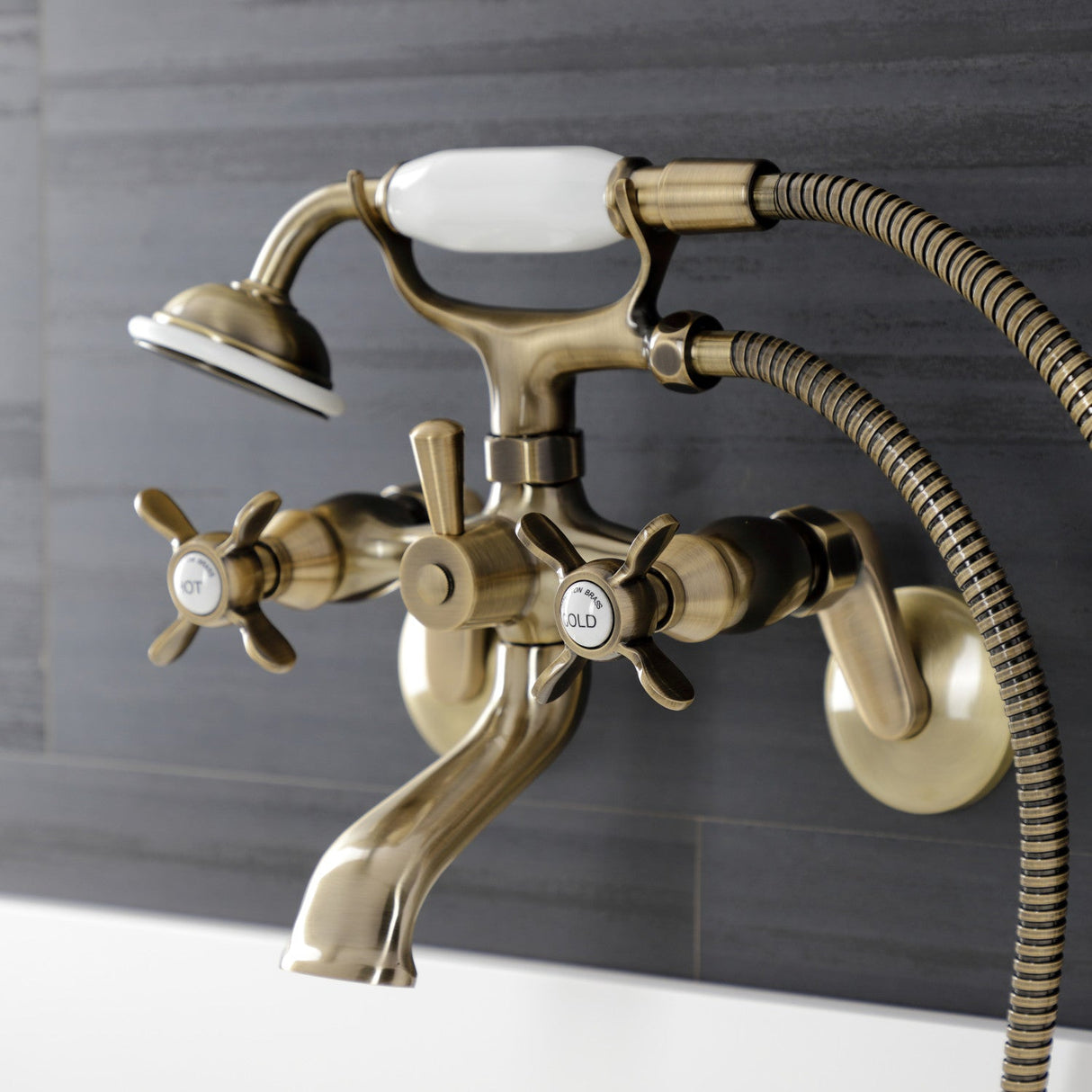 Essex KS286AB Three-Handle 2-Hole Wall Mount Clawfoot Tub Faucet with Hand Shower, Antique Brass