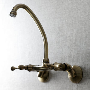 Kingston KS314AB Two-Handle 2-Hole Wall Mount Kitchen Faucet, Antique Brass