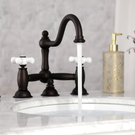 Restoration KS3915PX Two-Handle 3-Hole Deck Mount Bridge Bathroom Faucet with Brass Pop-Up, Oil Rubbed Bronze