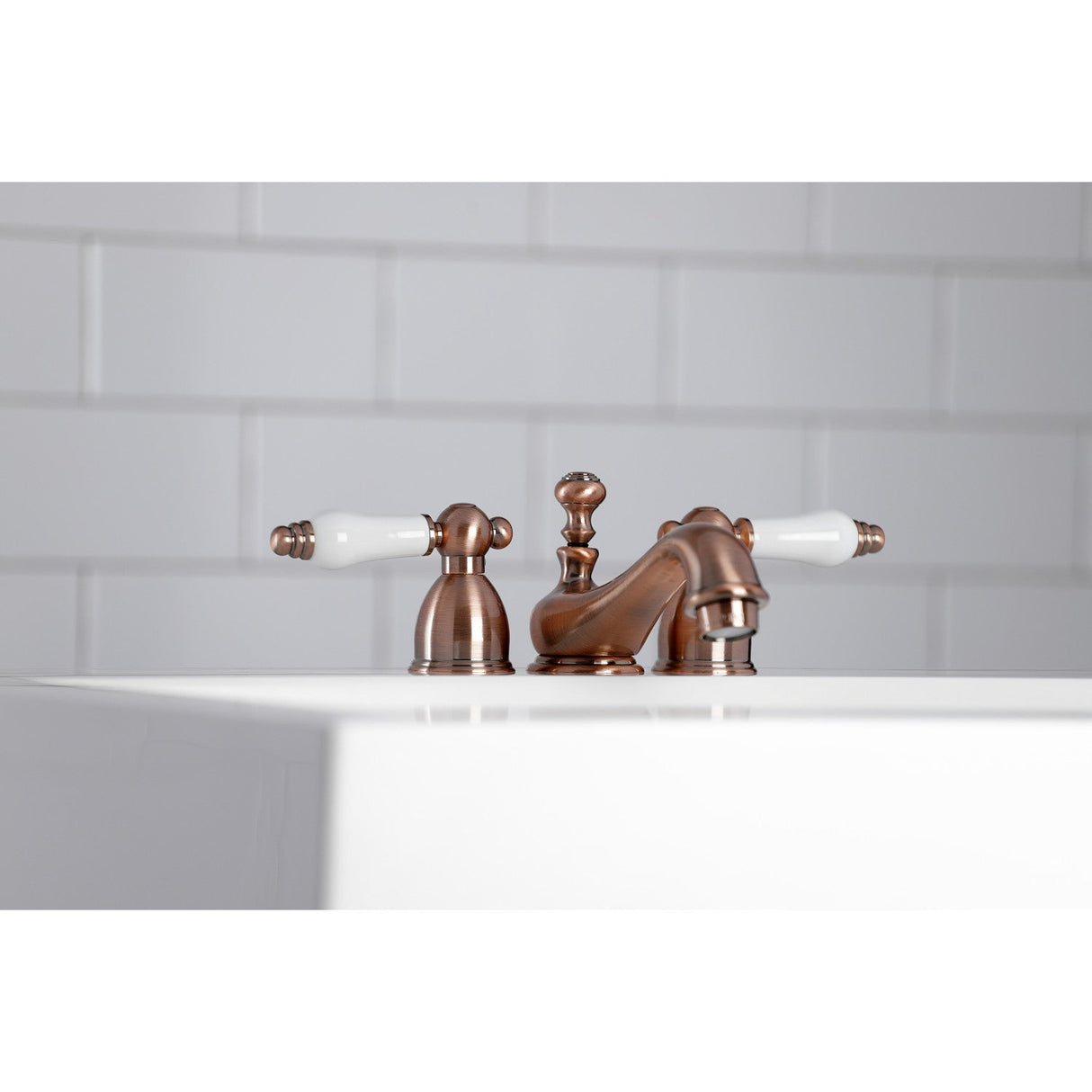 Restoration KS395PLAC Two-Handle 3-Hole Deck Mount Mini-Widespread Bathroom Faucet with Brass Pop-Up, Antique Copper