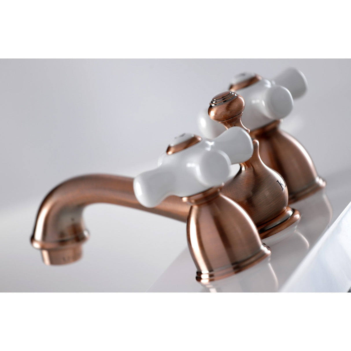 Restoration KS395PXAC Two-Handle 3-Hole Deck Mount Mini-Widespread Bathroom Faucet with Brass Pop-Up, Antique Copper