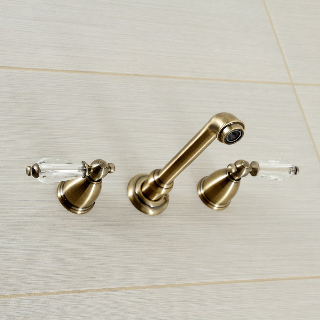 Wilshire KS7123WLL Two-Handle 3-Hole Wall Mount Bathroom Faucet, Antique Brass