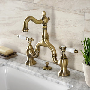 Bel-Air KS7973BPL Two-Handle 3-Hole Deck Mount Bridge Bathroom Faucet with Brass Pop-Up, Antique Brass