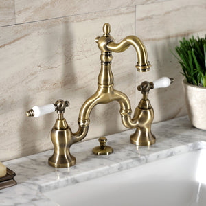 English Country KS7973PL Two-Handle 3-Hole Deck Mount Bridge Bathroom Faucet with Brass Pop-Up, Antique Brass