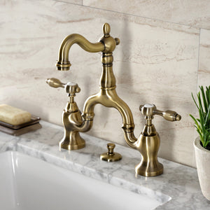 Tudor KS7973TAL Two-Handle 3-Hole Deck Mount Bridge Bathroom Faucet with Brass Pop-Up, Antique Brass