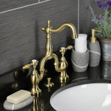 Tudor KS7977TAL Two-Handle 3-Hole Deck Mount Bridge Bathroom Faucet with Brass Pop-Up, Brushed Brass