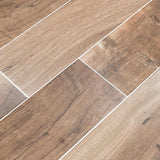 MSI Wood Collection palmetto cognac 6x36 porcelain floor wall tile product shot multiple planks NPALCOG6X36 angle view