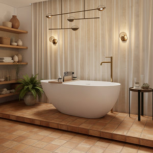 Modern bathroom with a freestanding bathtub in a bright setting