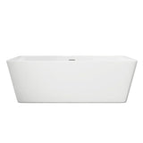 White freestanding bathtub against a gray wall