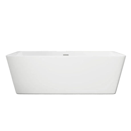 White freestanding bathtub against a gray wall