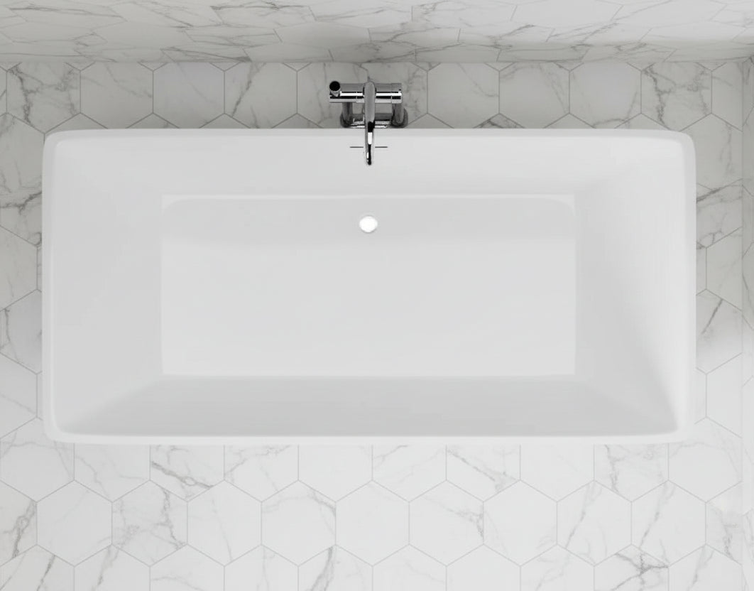 White rectangular sink with a faucet on a black hexagonal tiled wall
