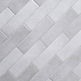 Renzo sterling 3x12 glossy ceramic gray wall tile NRENSTE3X12 product shot multiple tiles angle view #Size_3"x12"