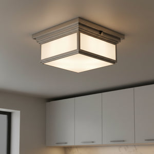 Ceiling light fixture with a square design on a white background