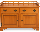 Wooden sideboard with two drawers and two doors on a white background, labeled 'Solid American Sprague & Carleton'.
