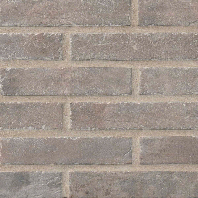 MSI brick collection capella taupe brick NCAPTAUBRI2X10 glazed porcelain floor wall tile product shot multiple bricks top view #Size_2-1/3"x10"