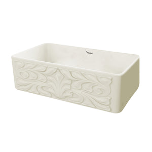 Farmhaus Fireclay Reversible Sink with a Gothichaus Swirl Design Front Apron on One Side, and a Fluted Front Apron on the Opposite Side.
