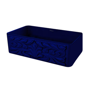 Farmhaus Fireclay Reversible Sink with a Gothichaus Swirl Design Front Apron on One Side, and a Fluted Front Apron on the Opposite Side.