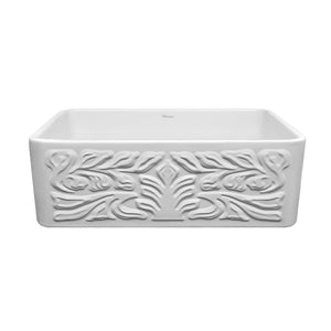 Farmhaus Fireclay Reversible Sink with a Gothichaus Swirl Design Front Apron on One Side, and a Fluted Front Apron on the Opposite Side.